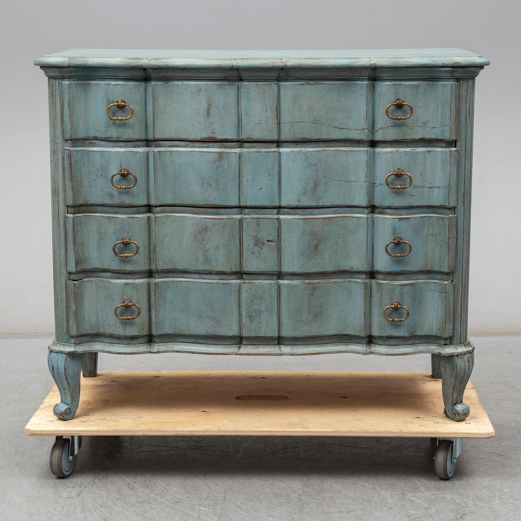 a baroque style chest of drawers from the 19th century.
