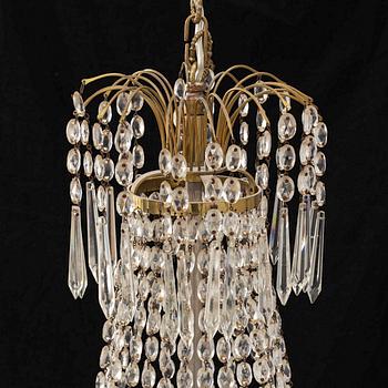 An Empire style chandelier, early 20th century.