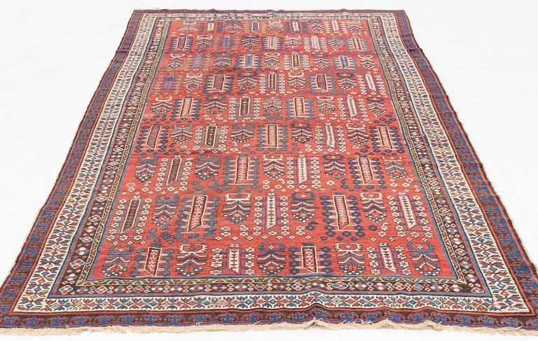 An antique carpet, probably Shirvan, c. 330 x 172 cm.
