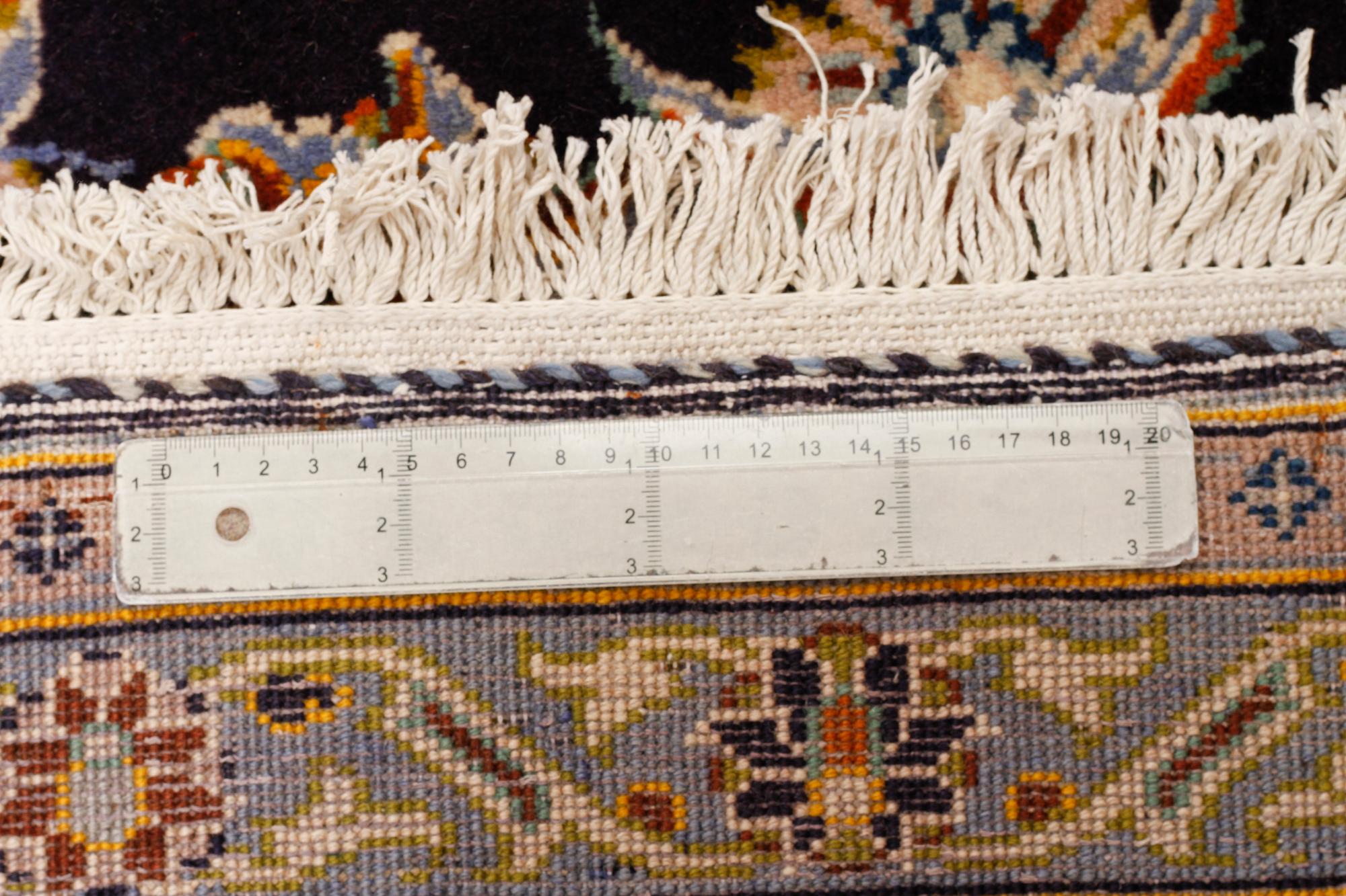 A Keshan rug, 435 x 307 cm.