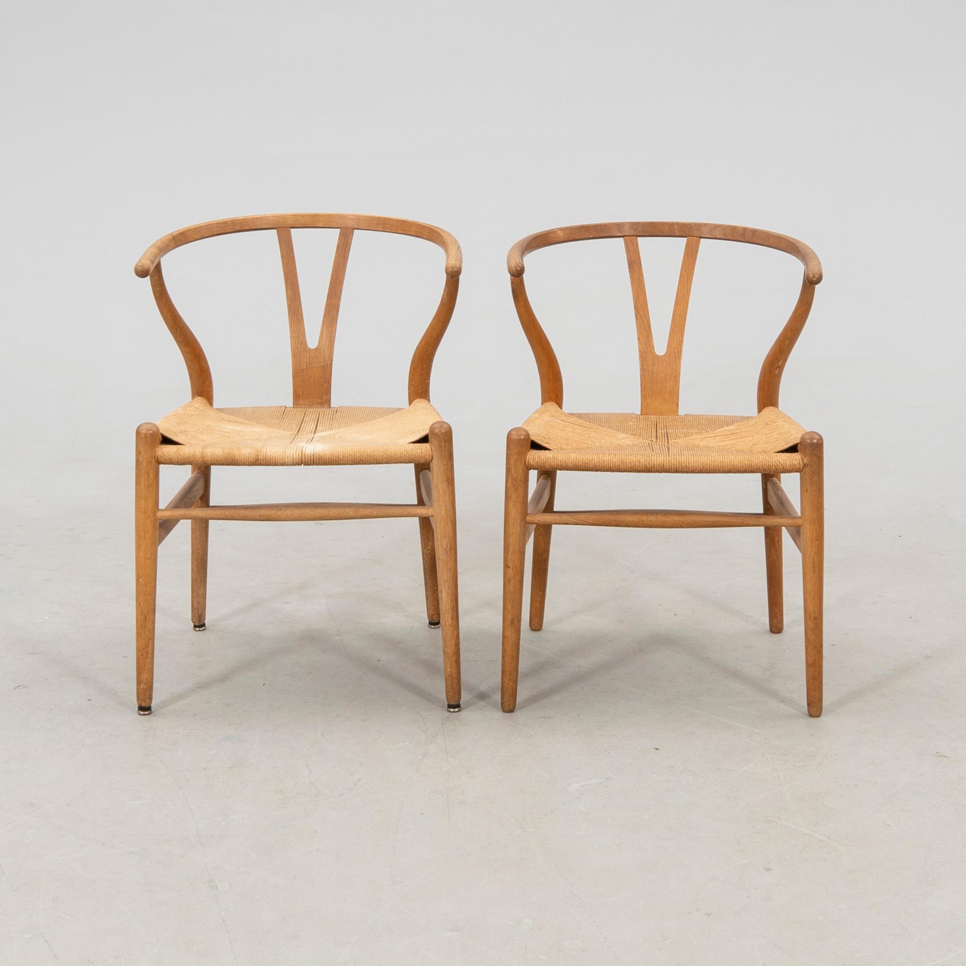 Hans J. Wegner, chairs, a pair, "The Y-Chair", model CH-24, Carl Hansen & Søn, Denmark.