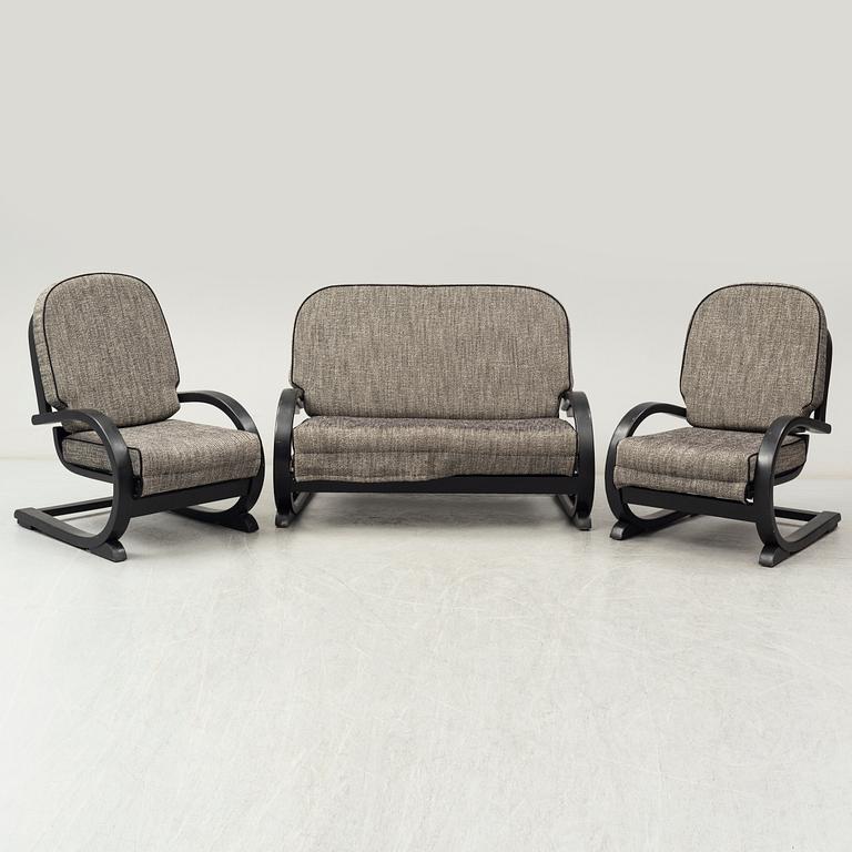 An 'Famulus' sofa and two easy chairs by JP Hully with RD number 809095 for 1936, by Gane Ltd.