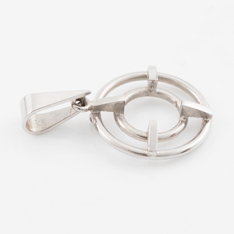 Brooch/pendant, 18K white gold with sapphire and brilliant-cut diamonds.