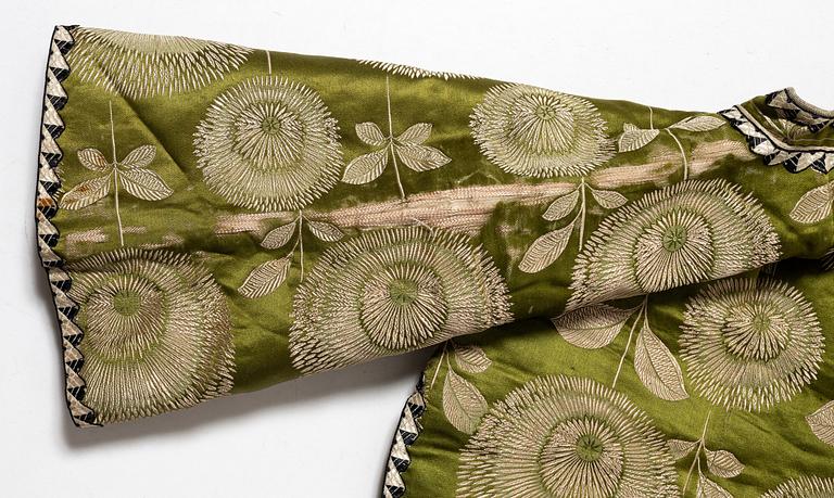 A Japanese silk brocade and fur childrens jacket, Meiji (1868-1912).