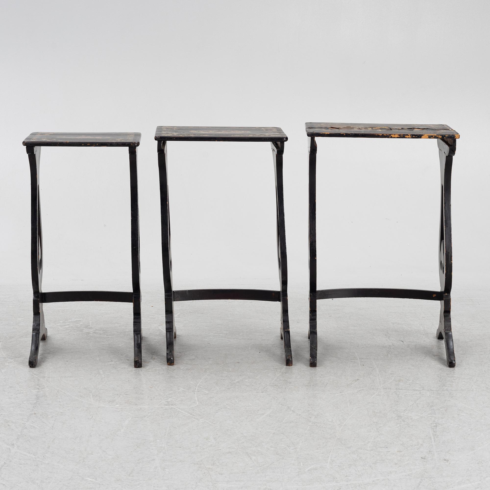 A lacquered nesting table, around 1900.