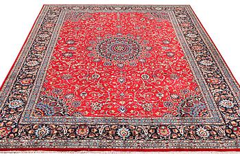 A Kashan carpet, c. 400 x 297 cm.