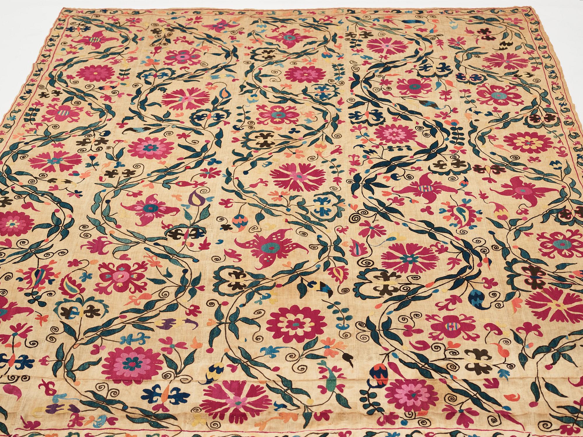 An embroidery, an antique suzani, Ura Tube or the Ferghana valley, ca 250,5-253,5 x 185,5-191,5 cm.