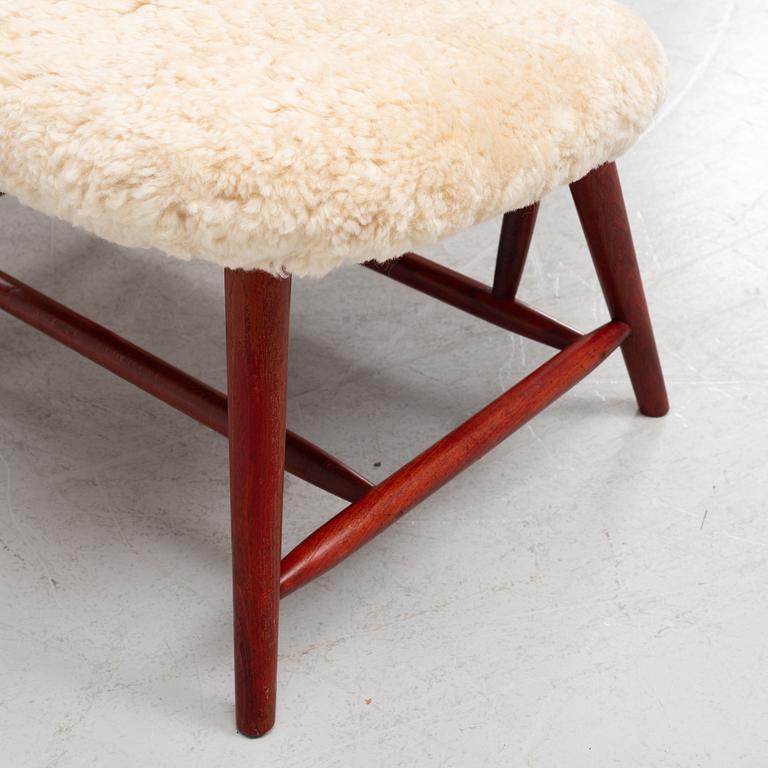 Alf Svensson, a pair of 'TeVe' easy chairs with new sheepskin upholstery, 1950s.