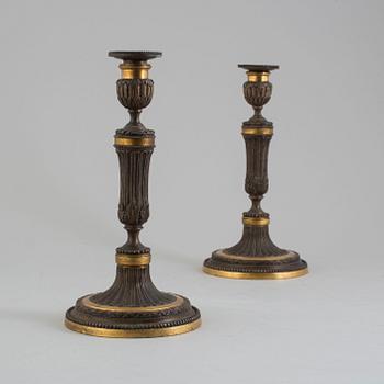 A pair of late 18th century Louis XVI bronze candlesticks, France.