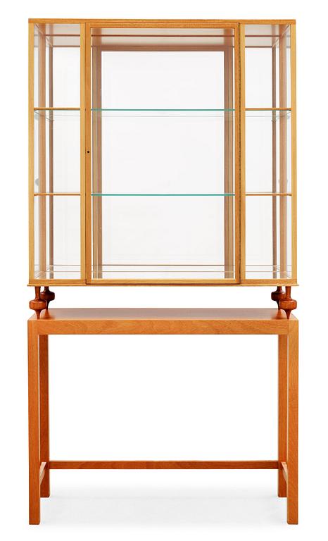 A Josef Frank mahogany showcase cabinet, Svenskt Tenn, model 2077.