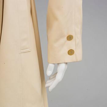 A trench-coat by Guy Laroche.