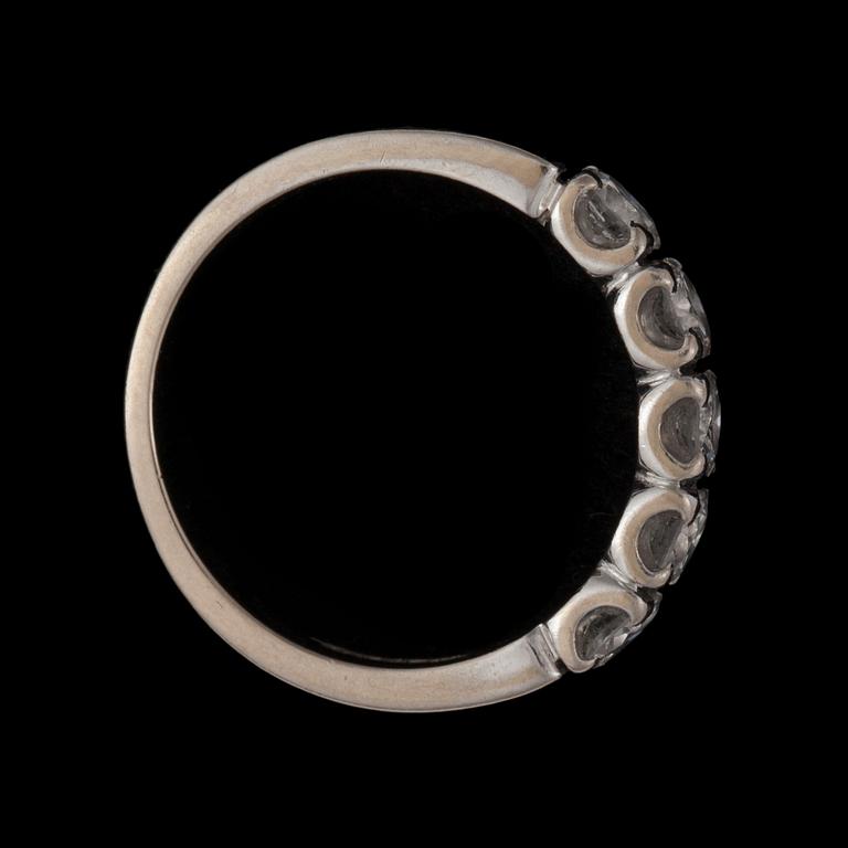 A brilliant-cut diamond eternity ring. Total carat weight circa 1.00 ct.