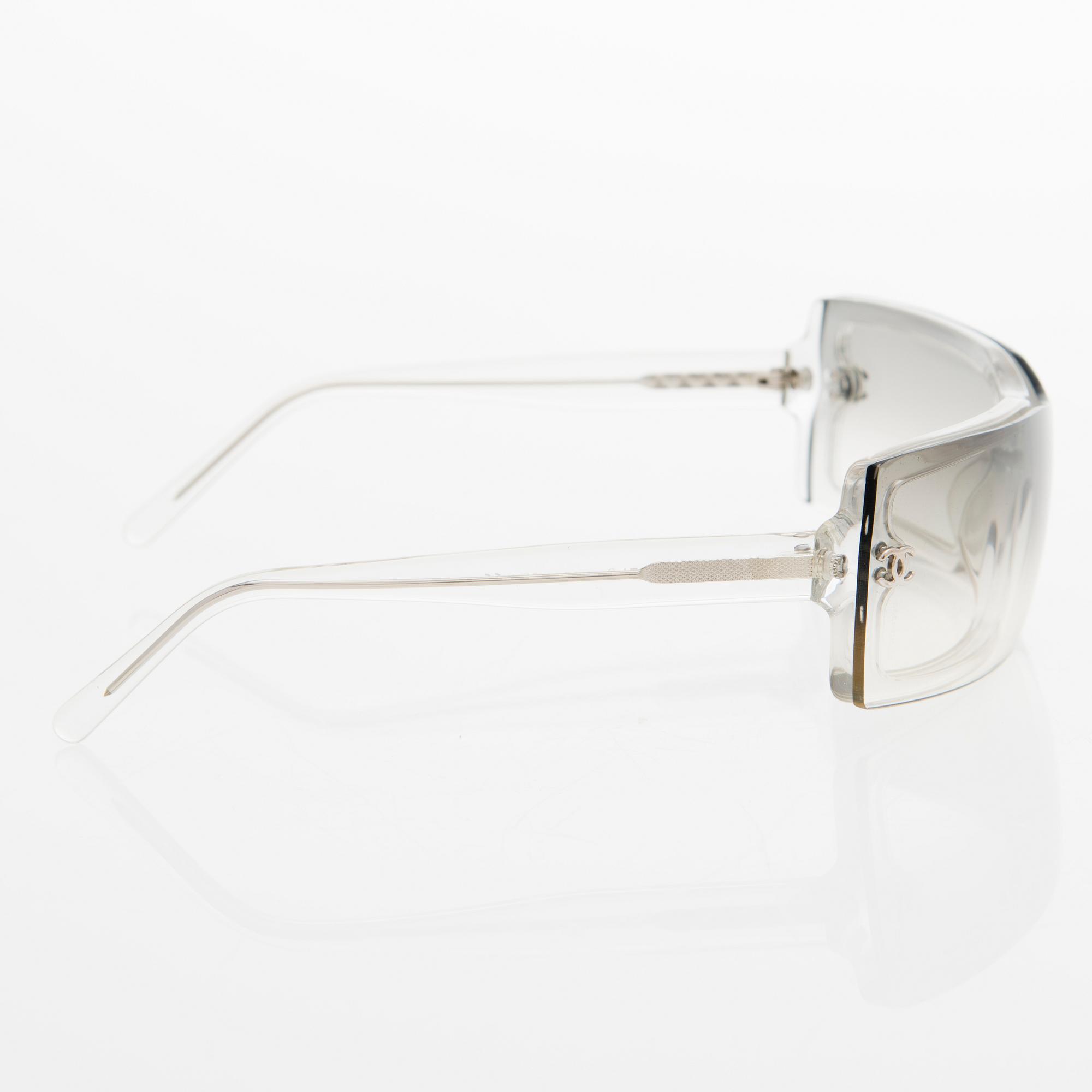 A Pair of Model 5067 Sunglasses.