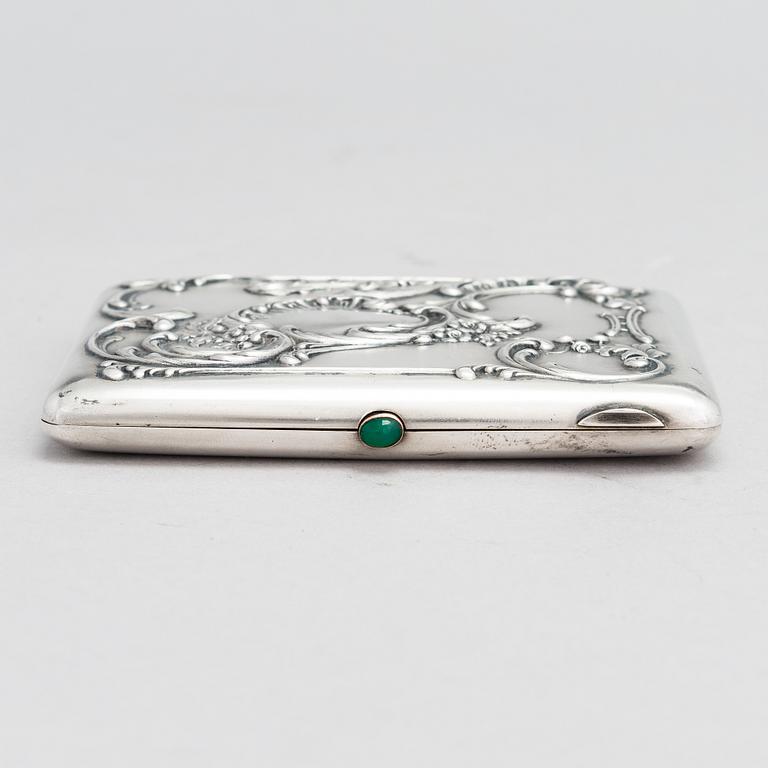 A Russian silver cigarette case, maker's mark of Mikhail Tarasov, Moscow 1908-14.