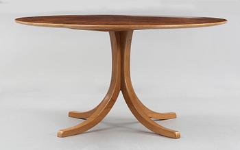 A Josef Frank mahogany and burled wood dining table, Svenskt Tenn, model 1020.