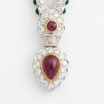 Brooch, white gold with cabochon-cut emeralds, rubies, sapphires, and brilliant- and square-cut diamonds.