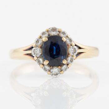 Ring, carved, 14K gold with sapphire and brilliant-cut diamonds.