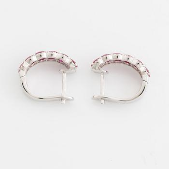 Earrings with rubies and brilliant-cut diamonds.