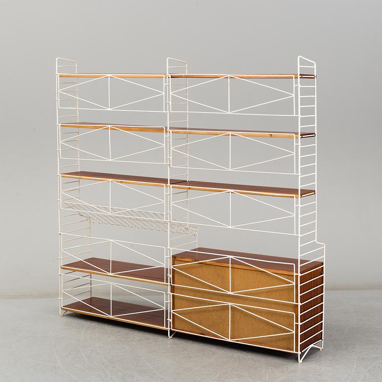 A 'String" bookcase, designed by  Nils Strinning,