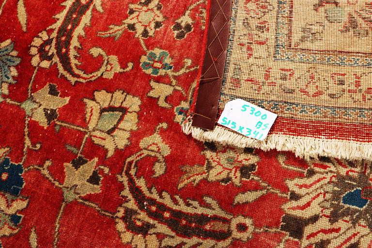 An oriental carpet, c. 515 x 341 cm.
