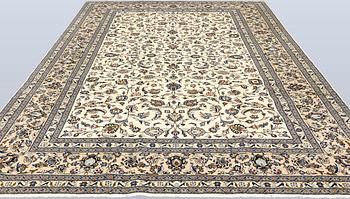 A Keshan carpet, c. 365 x 250 cm.