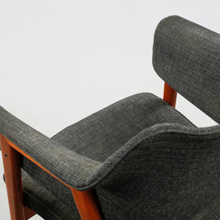 A pair of armchairs designed by Karl-Erik Ekselius for JOC, Vetlanda, made around the middle of the 20th century.