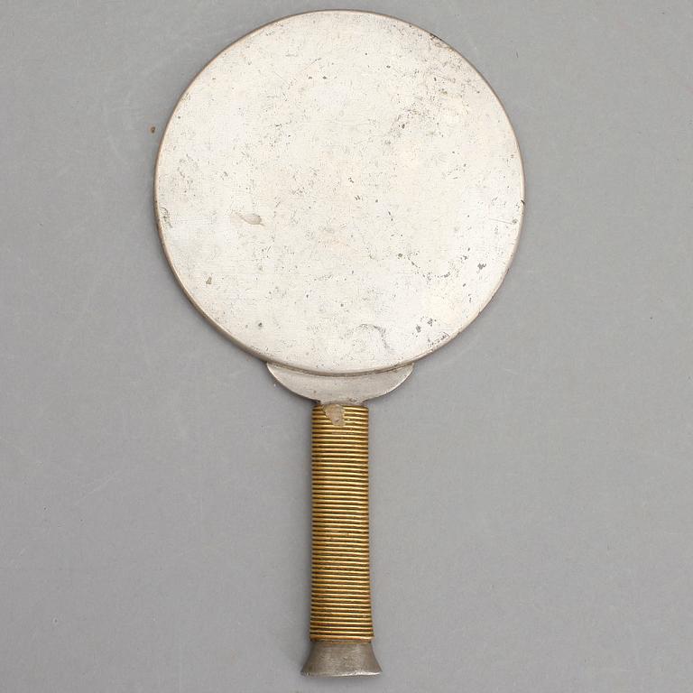 HANDSPEGEL, tenn, komponerad av Estrid Erikson och Björn Trägårdh, Firma Svenskt Tenn, 1900-tal.