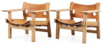 A pair of Børge Mogensen 'The Spanish Chair' in oak and leather by Fredericia Stolefabrik, Denmark.