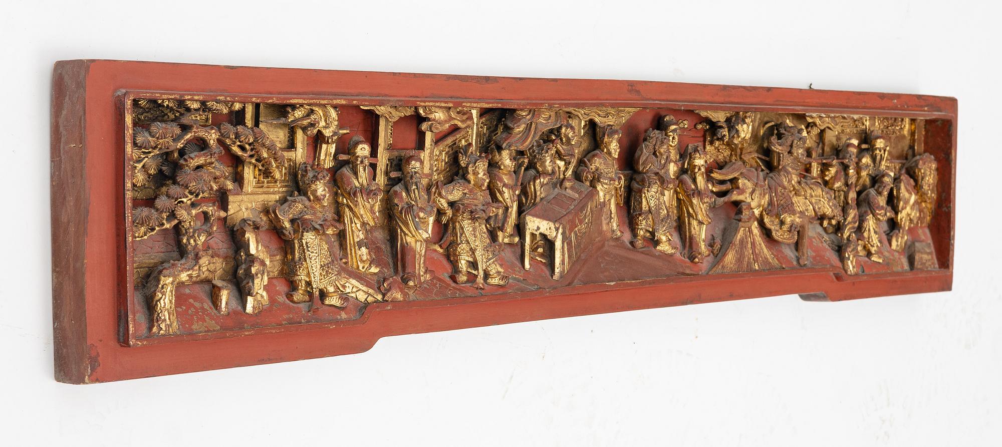 A carved wooden relief, China, late Qing dynasty, late 19th century.