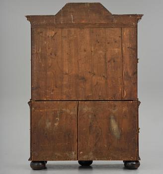 A Swedish late baroque burr-alder cabinet, first part 18th century.