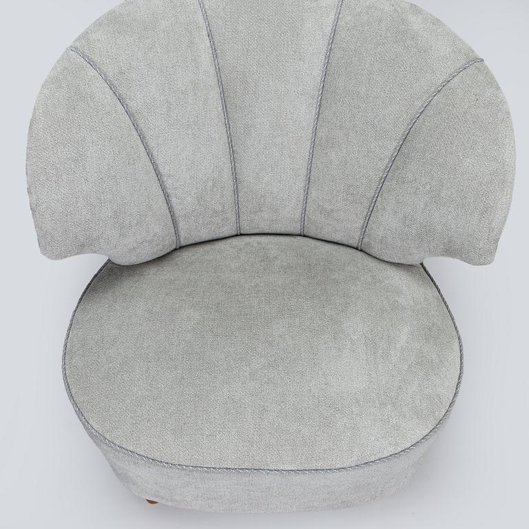 A pair of mid 20th century armchairs.