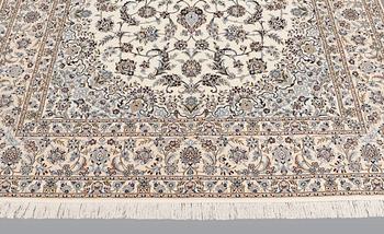 A carpet, Nain part silk s.k 6LAA, ca 310 X 209 cm.