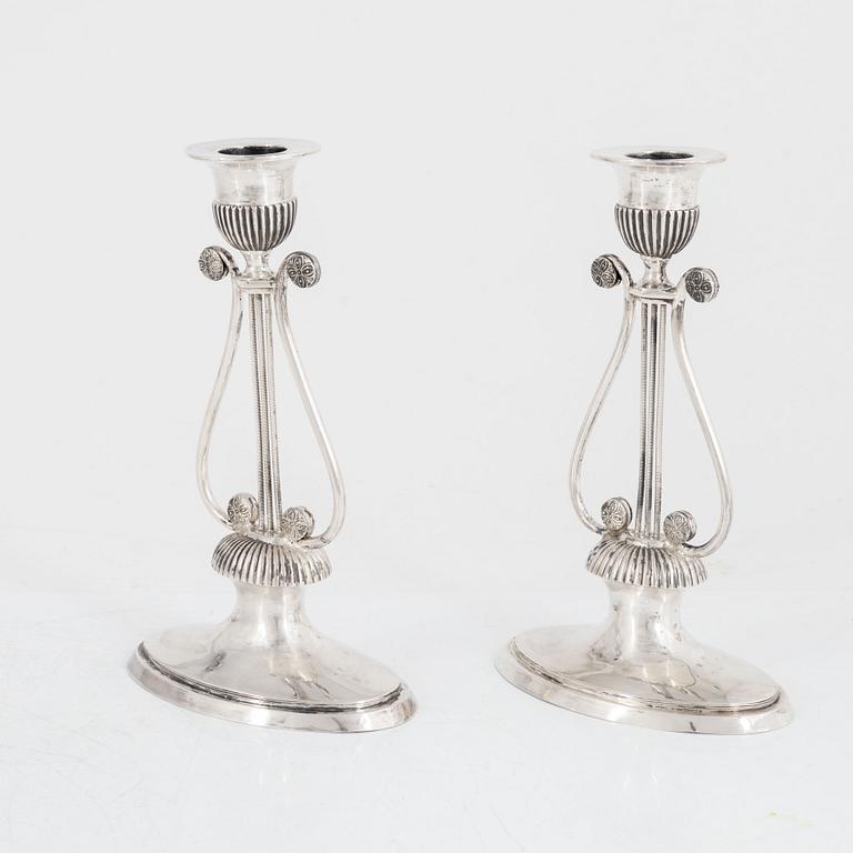 A pair of Swedish silver Empire candlesticks, mark of Gustaf Folcker, Stockholm 1814.