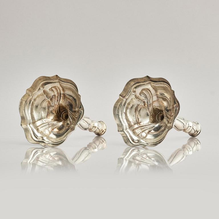 A pair of German silver Rococo candlesticks, marks of Johann Jacob Baur, Augsburg 1777-1779.