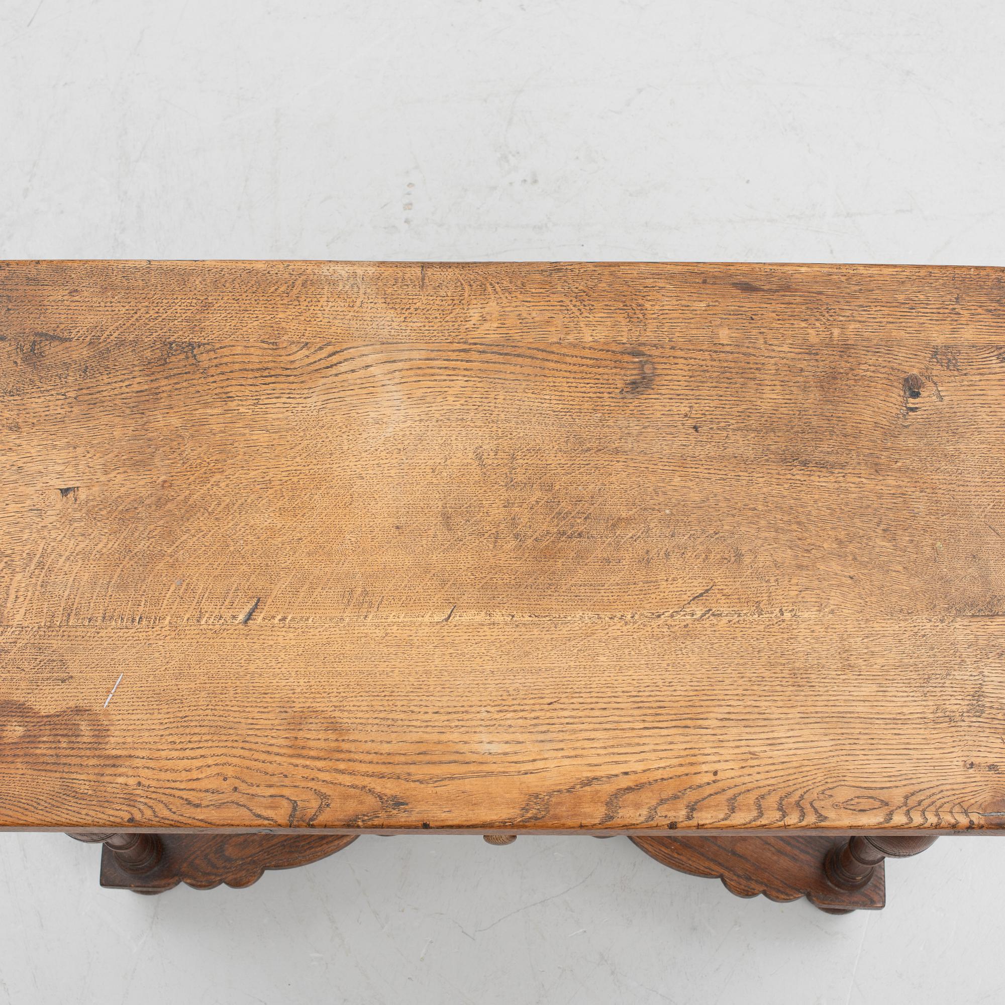 A table, late 19th century. Baroque style.