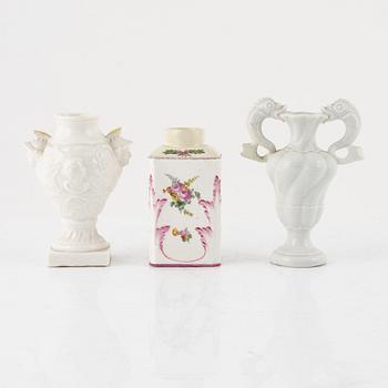 Two white glazed Nymphenburg vases and a Swedish Marieberg tea caddy, 18th Cenury.