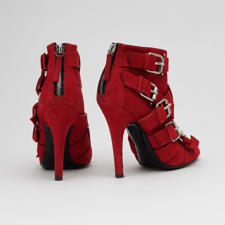 BALMAIN, DESIGN GIUSEPPE ZANOTTI, a pair of red suede boots.