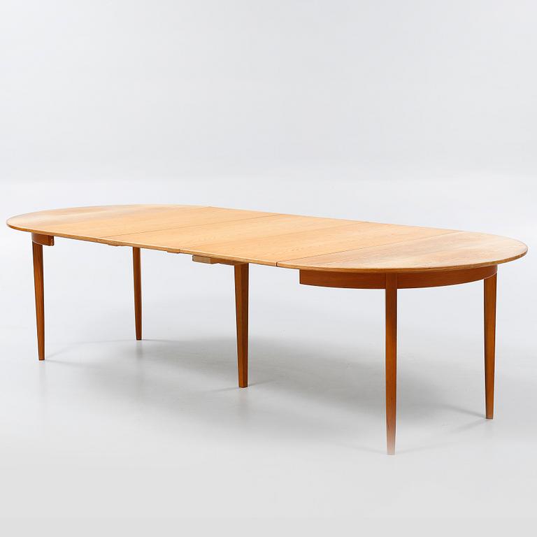 A dining table designed by Carl Malmsten and named "Calmare Nyckel".