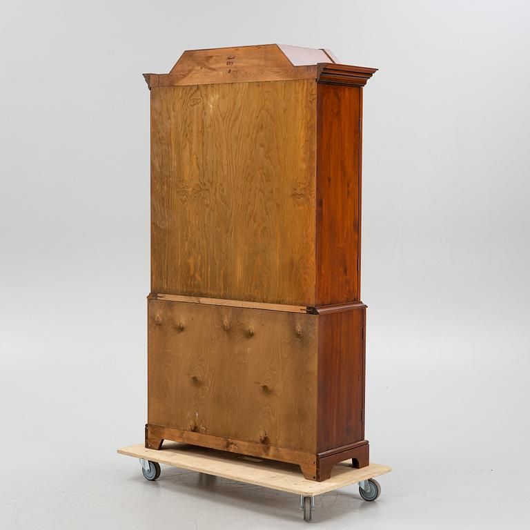 A vitrine cabinet from Åmells, dated 1975.
