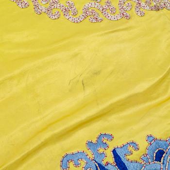 A yellow-ground embroidered silk robe, 20th century.