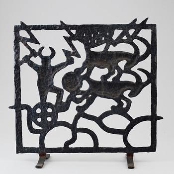 A cast iron fire guard by Olle Hermansson, Husqvarna.