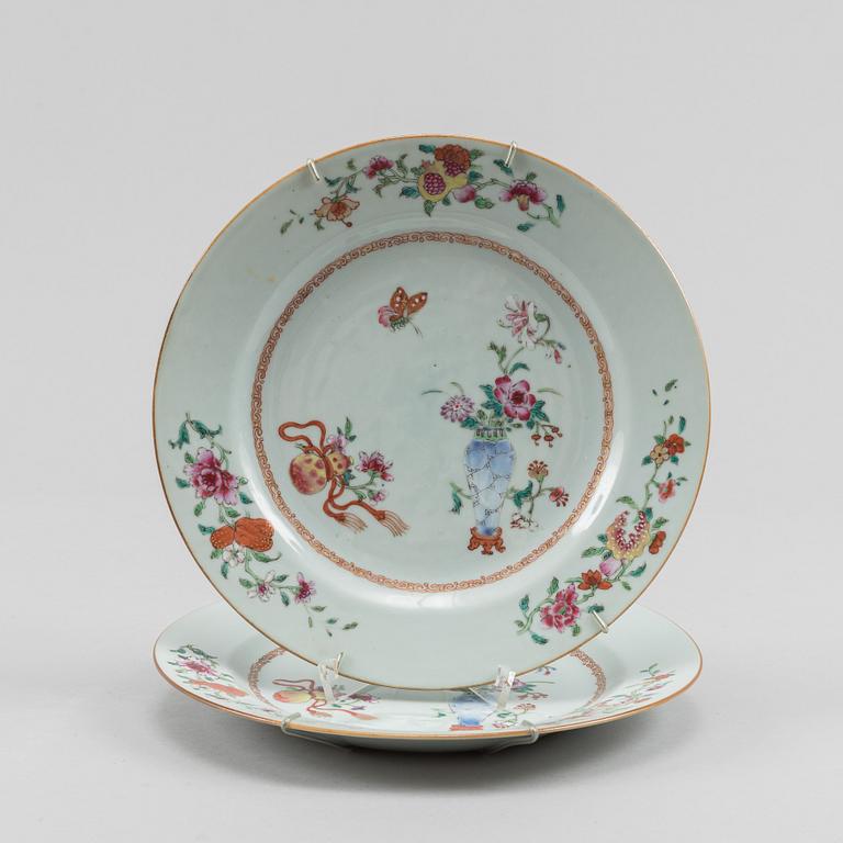 A famille rose dish and two dinner plates, Qing dynasty, Qianlong (1736-95).