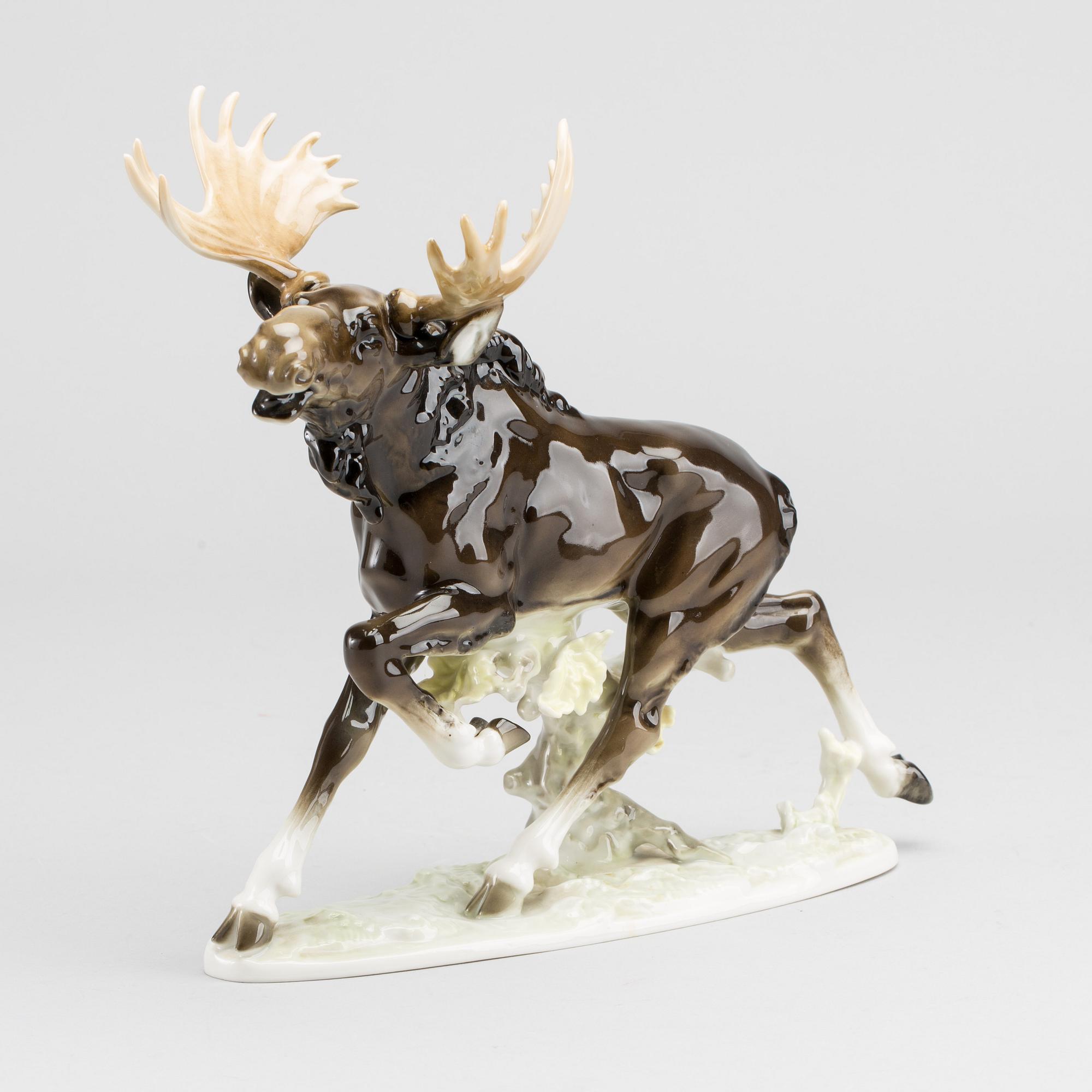 A PORCELAIN FIGURINE BY KARL TUTTER FOR HUTSCHENREUTER.