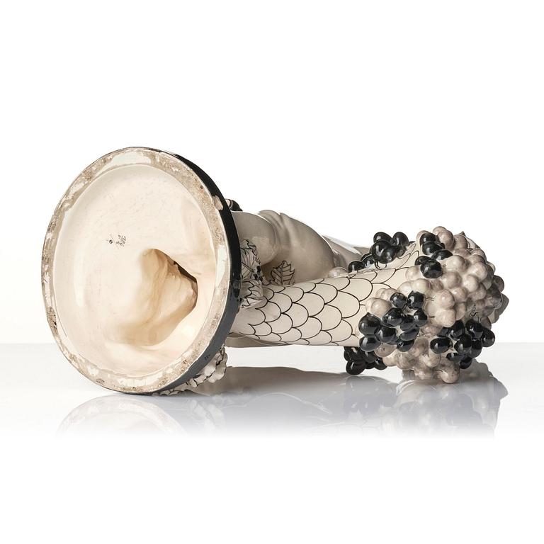 Bertold Löffler, a ceramic sculpture of a putto with cornucopia, model 156, Wiener Keramik, Vienna, Austria, 1908- 1912.
