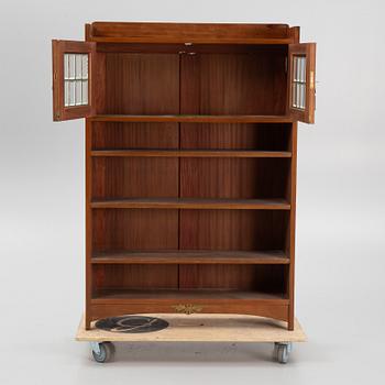 A bookcase, early 20th Century.