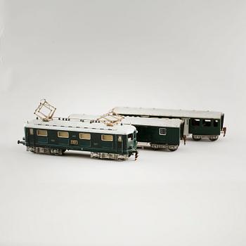A 1940/50s model train set of 31 pcs in O-scale made by HAG, Switzerland.