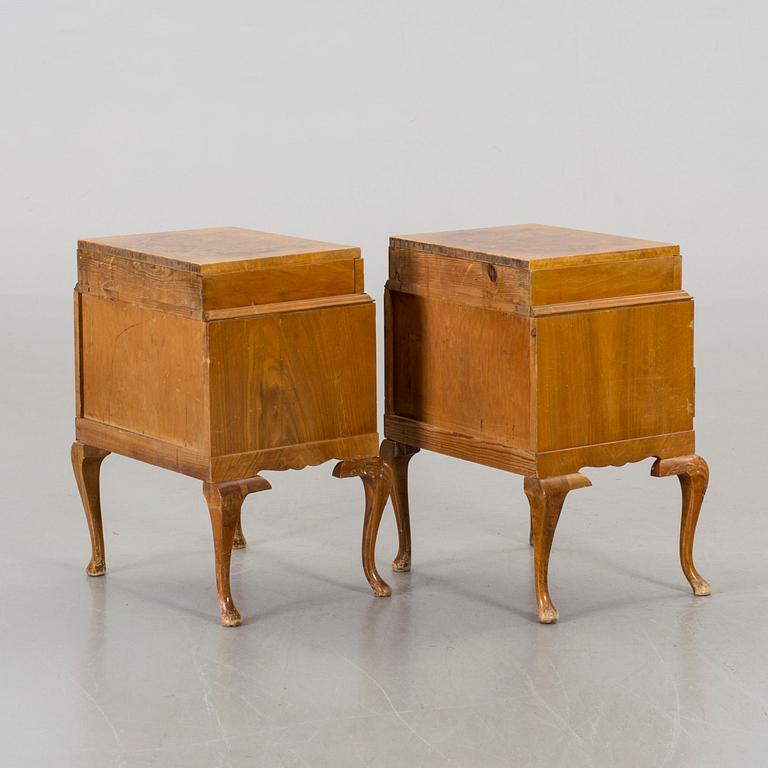 A pair of Rococo-style bedside tables.