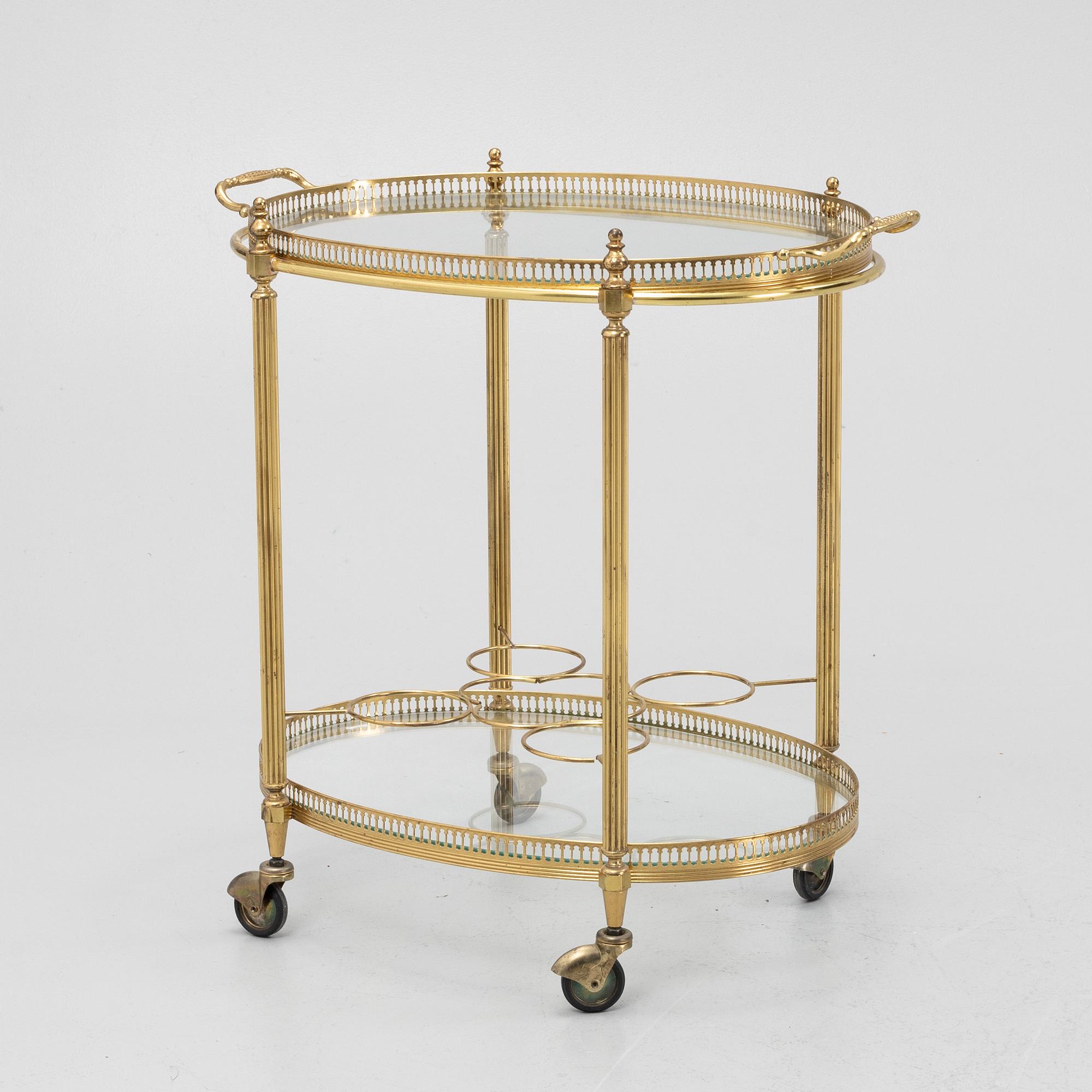 A brass and glass trolley, second part of the 20th Century.