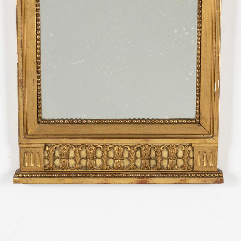 A Gustavian style mirror, early 20th century.
