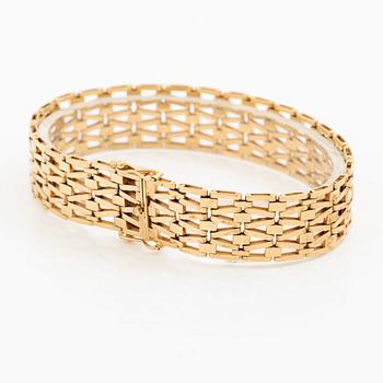 Arm bracelet, 18K gold.